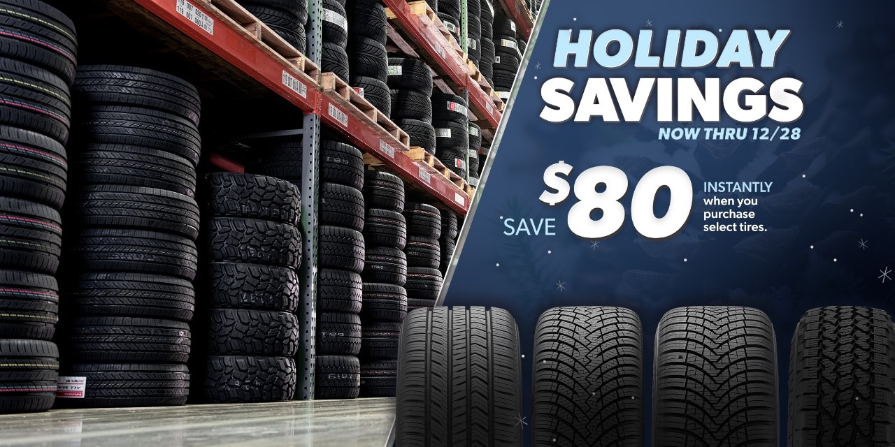 Tire Rack's Holiday Savings deals, now through 12/28, with warehouse tire racks and four featured tires below.