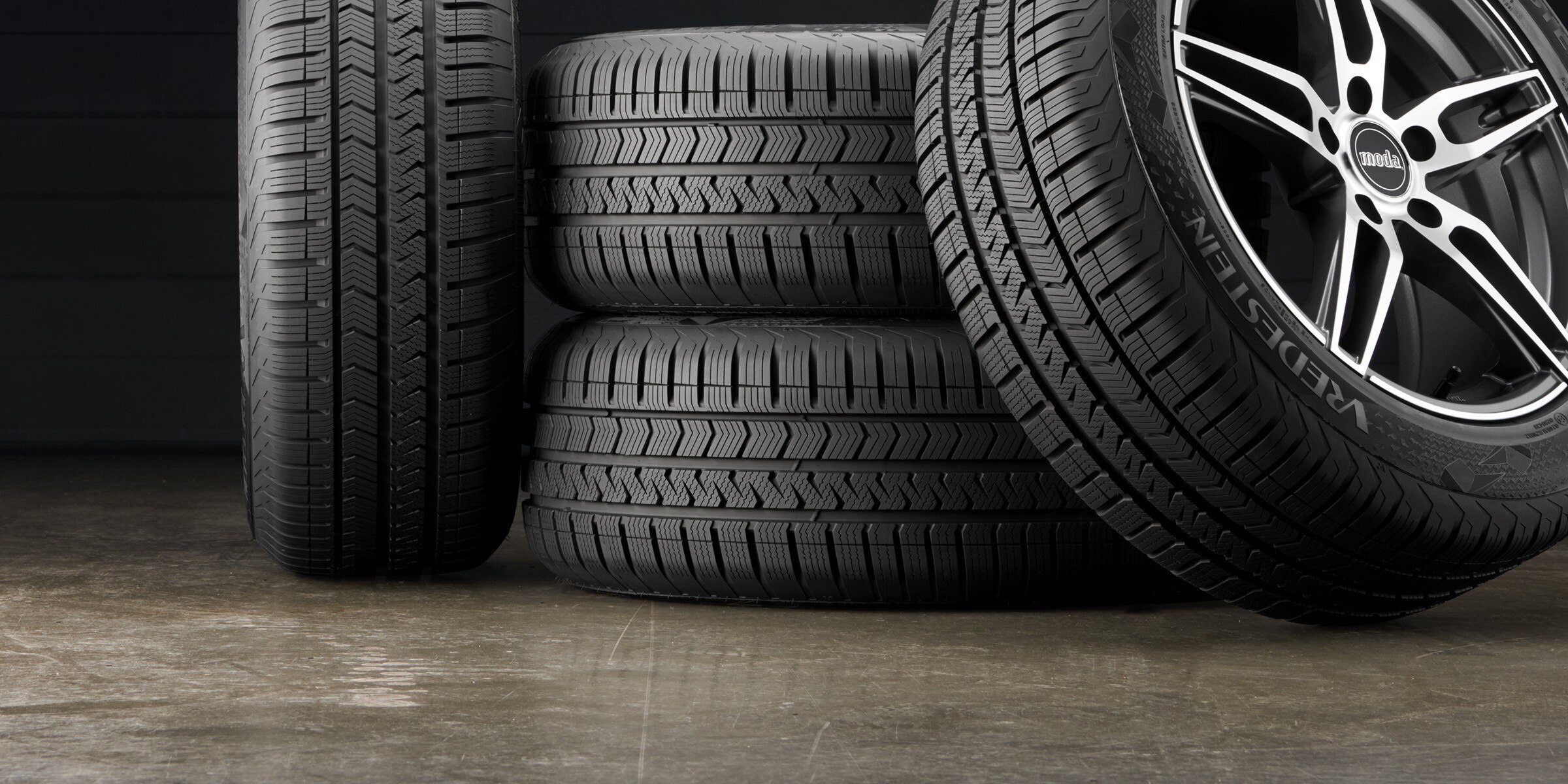 Vredestein Quatrac 5 tires stacked with a Moda MD26 wheel, showing a Tire & Wheel Package.