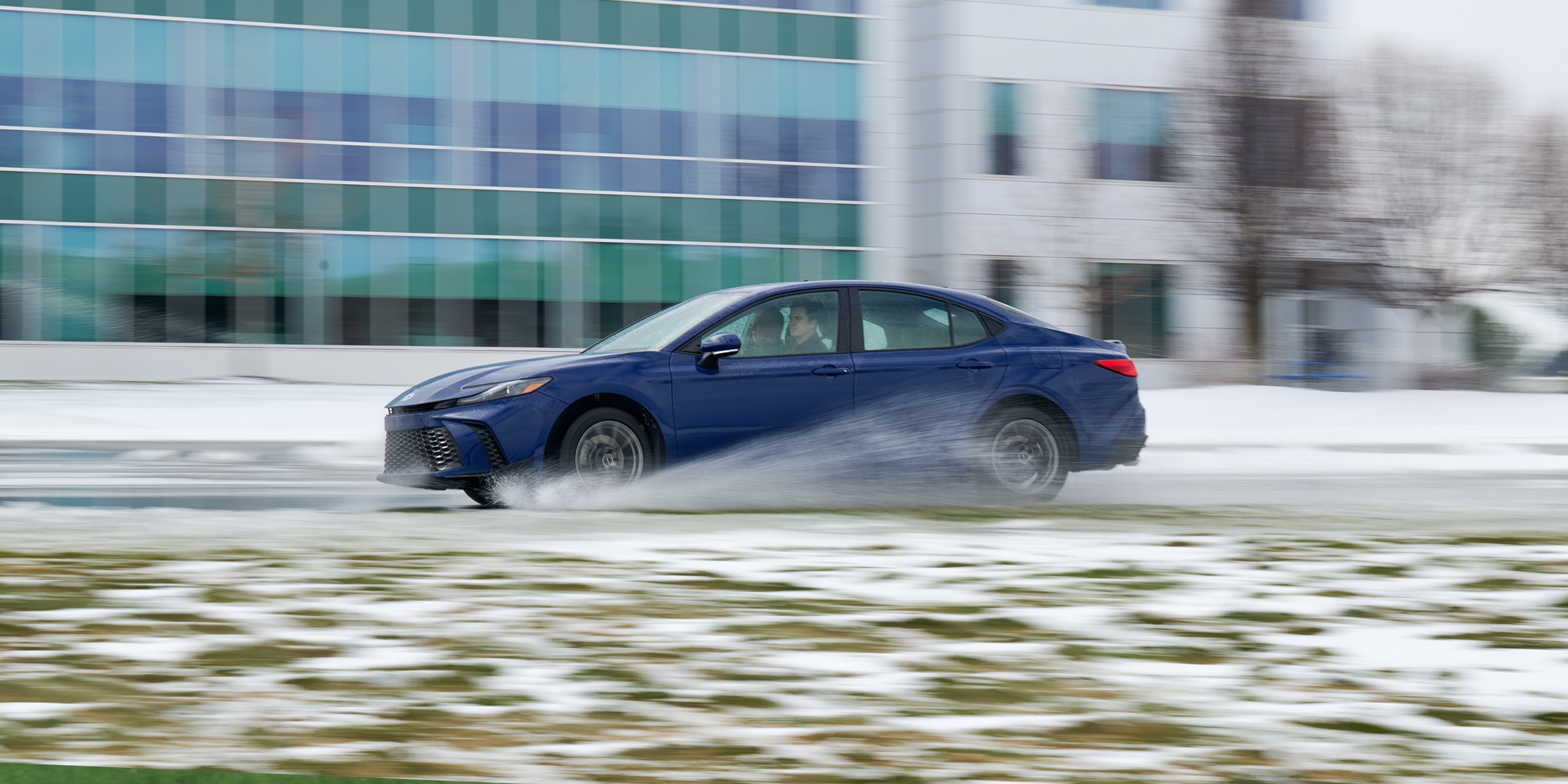 Testing all-weather vs. winter tires using a blue Toyota Camry