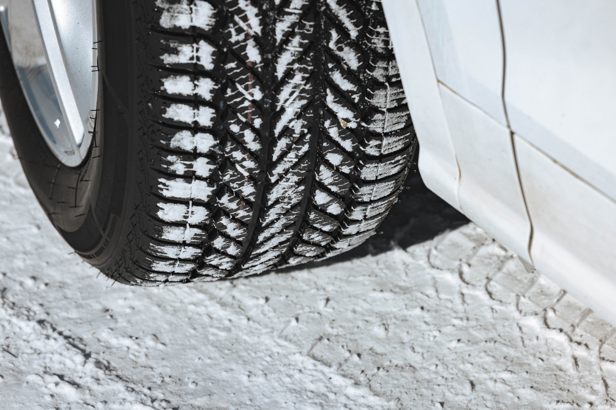 All-weather tire driving in winter conditions