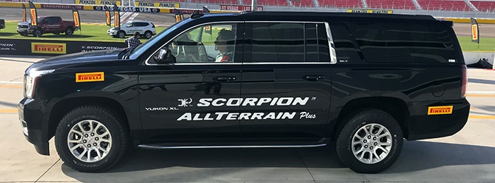 Left profile of a GMC Yukon mounted with Scorpion All Terrain Plus tires.