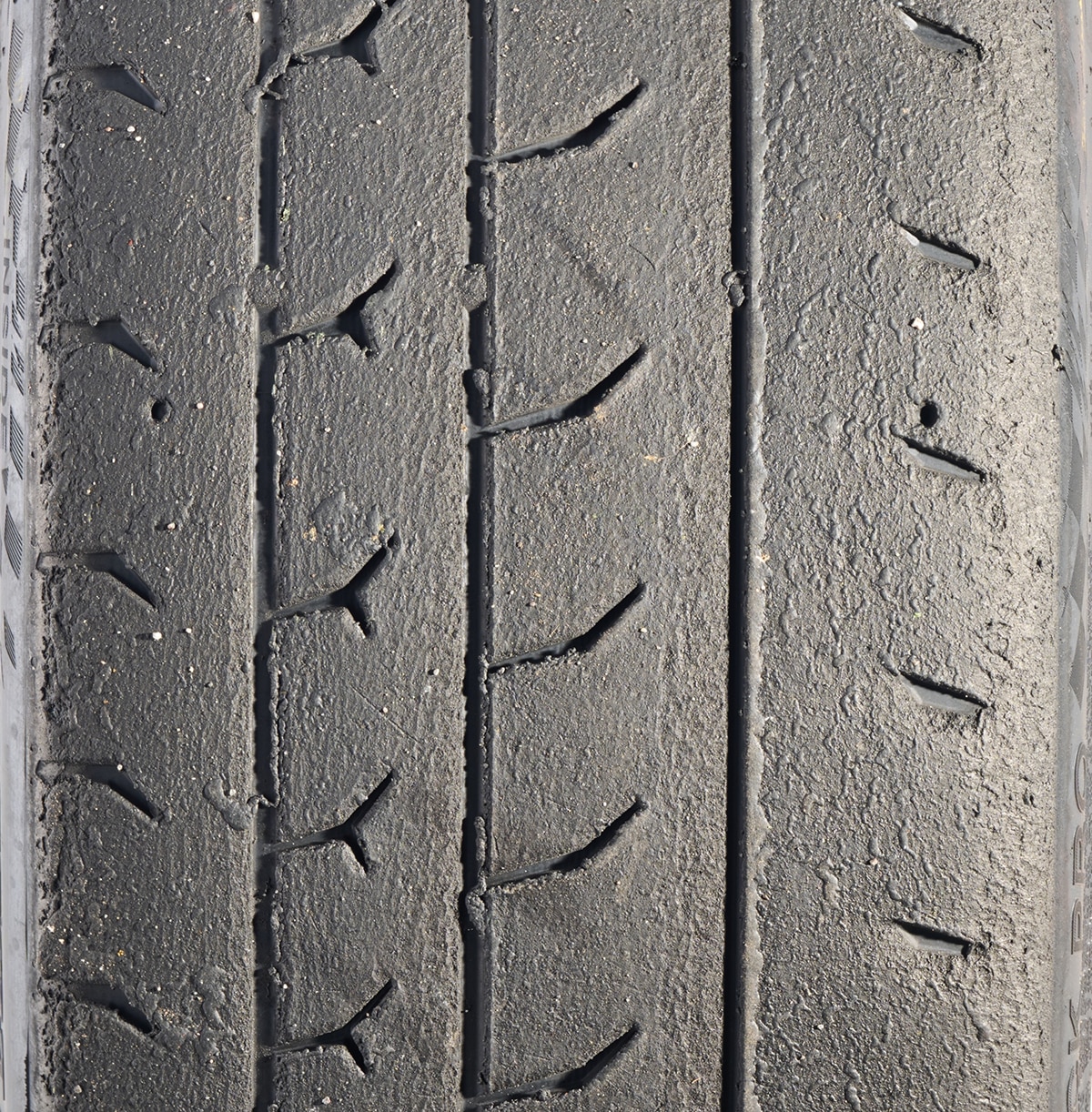 A close up images of the Hoosier Track Attack Pro tread wear