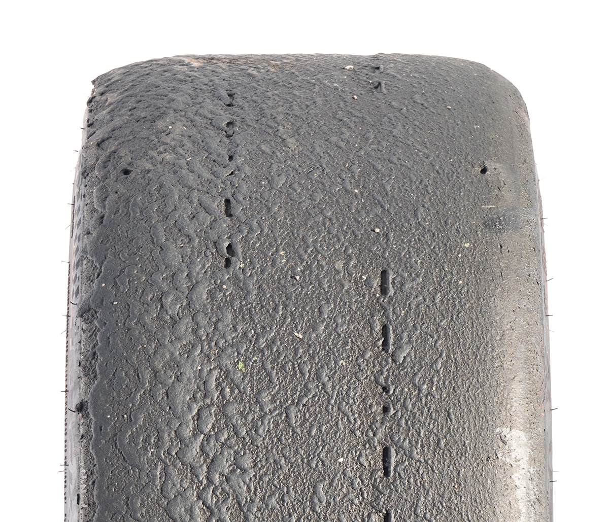 A close up images of the Hoosier Track Attack R Race A8 tread wear